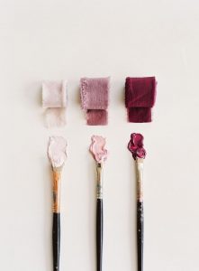 a paint swatch in different shades of pink