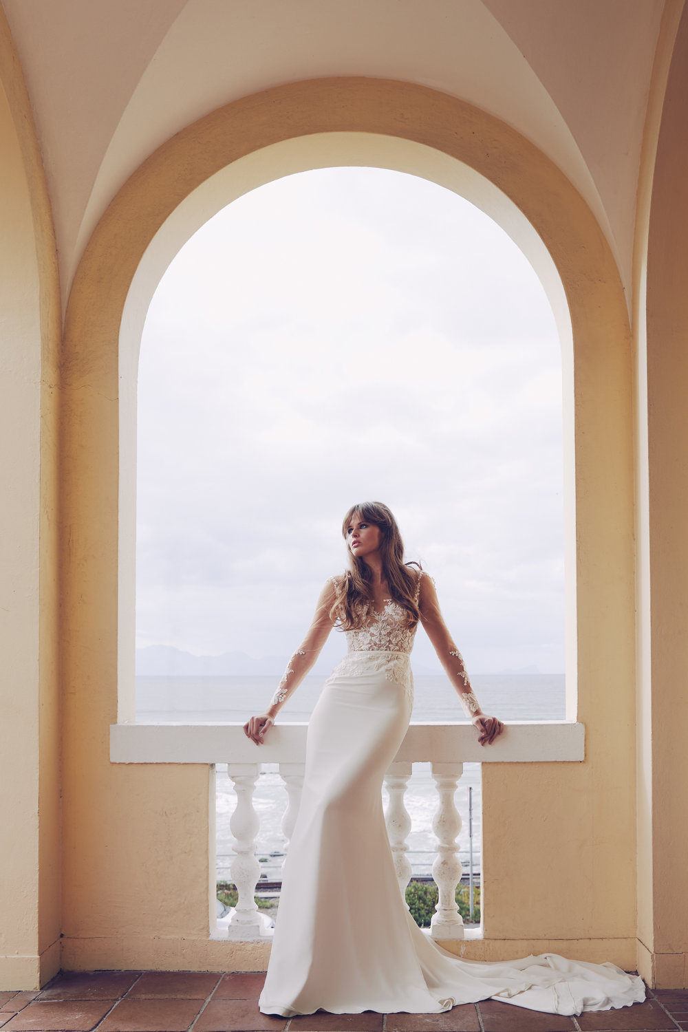 bride standing by window